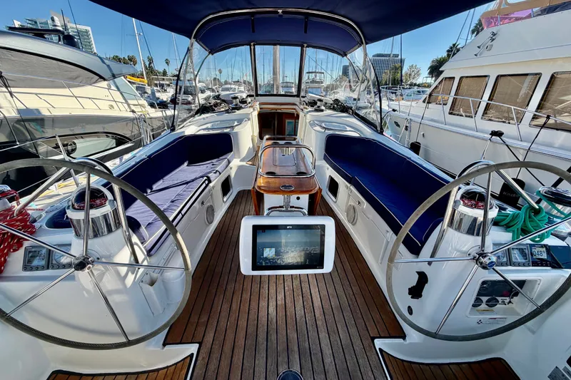 Slide: The Image of Cockpit of 2007 Jeanneau Sun Odyssey 49 DS sailboat with dual steering wheels. - 36