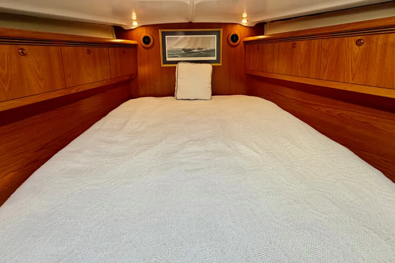 Slide: The Image of Luxurious cabin interior of 2007 Jeanneau Sun Odyssey 49 DS yacht with cozy bedding. - 80