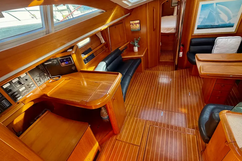 Slide: The Image of Luxurious interior of 2007 Jeanneau Sun Odyssey 49 DS sailboat with wood finish and seating. - 91