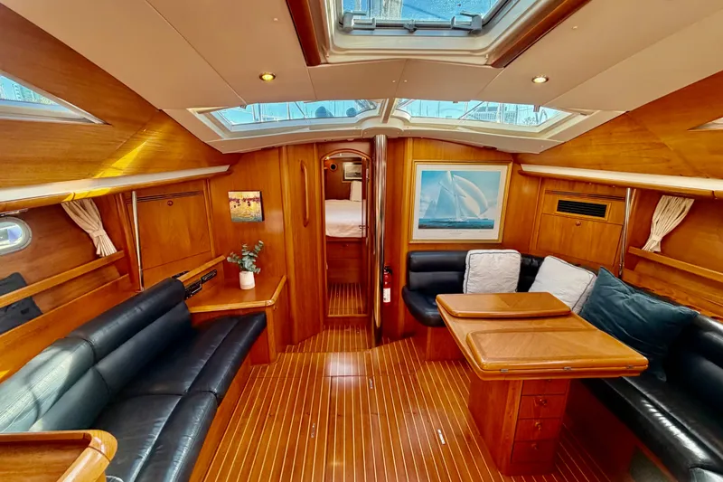 Slide: The Image of Luxurious interior of 2007 Jeanneau Sun Odyssey 49 DS yacht with elegant wood finish. - 69