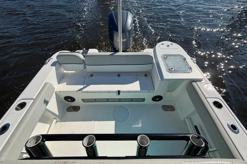 Slide: The Image of 2021 Sea Fox 248 Commander boat interior with seating and fishing rod holders. - 10