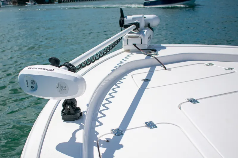 Slide: The Image of 2023 Sportsman Masters 247 Bay Boat with Minn Kota trolling motor on deck. - 18