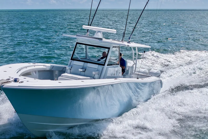 Slide: The Image of 2017 Yellowfin 42 Offshore boat cruising on open ocean waters. - 3