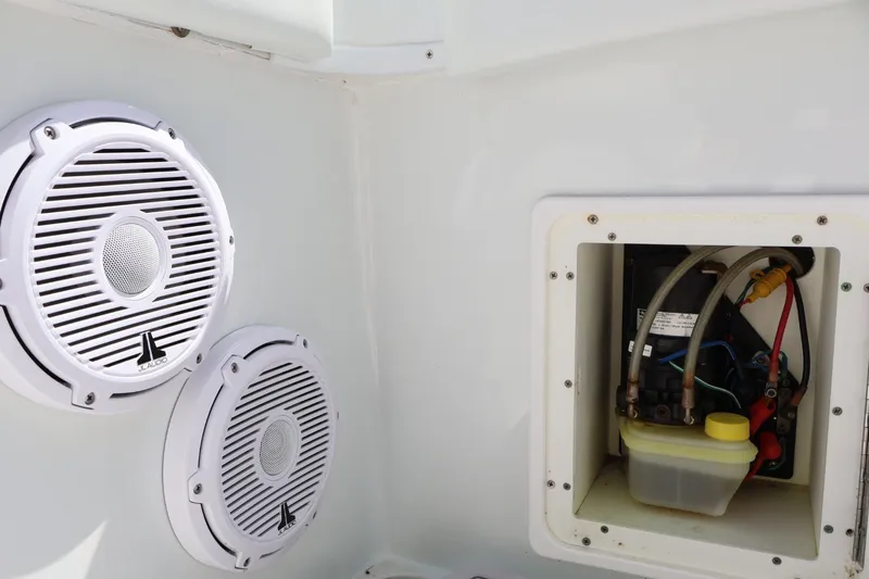 Slide: The Image of 2017 Yellowfin 42 Offshore boat speakers and wiring compartment detail. - 32