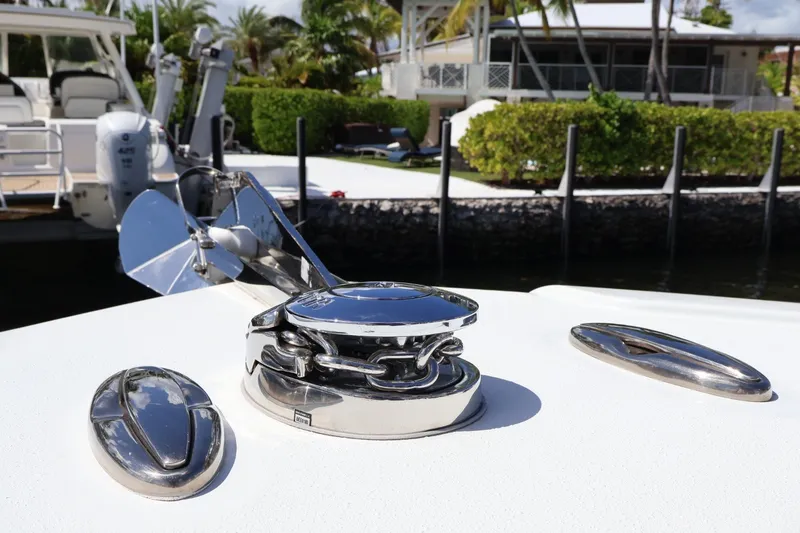 Slide: The Image of 2017 Yellowfin 42 Offshore boat anchor and chain detail at dock. - 27