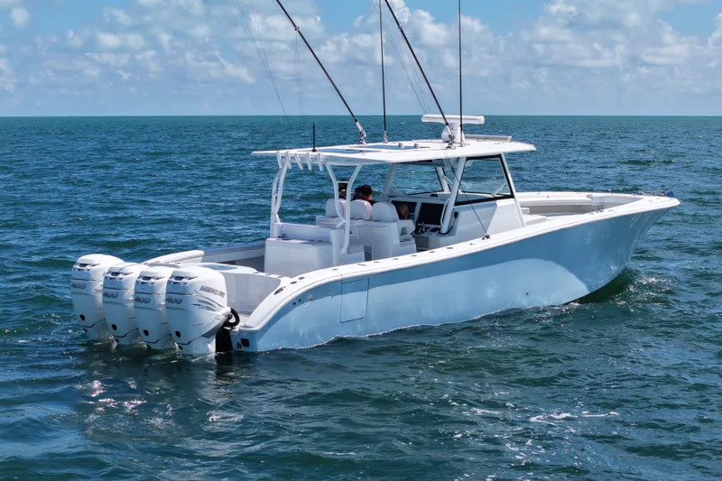 The Image of 2017 Yellowfin 42 Offshore boat cruising on open water with four outboard engines. - 1