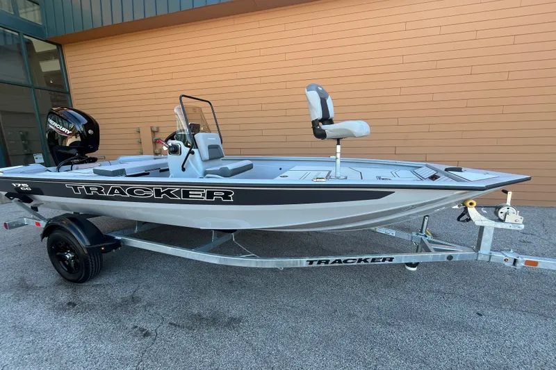The Image of 2027 Tracker Bass Tracker 175 CC boat on trailer, parked outdoors. - 0