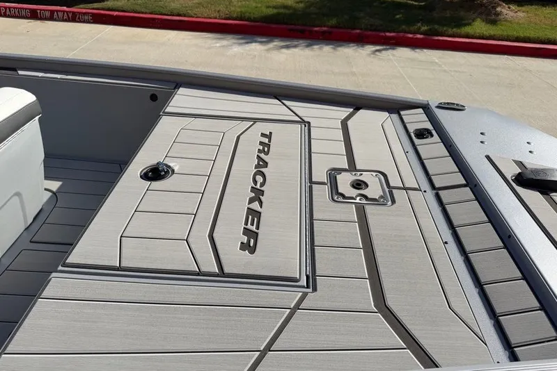 Slide: The Image of 2027 Tracker Bass Tracker Classic CC boat deck with sleek design and branding. - 14