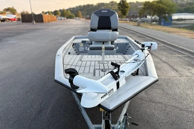 Slide: The Image of 2027 Tracker Bass Tracker 175 CC boat with Minn Kota trolling motor on a trailer. - 16