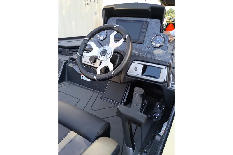 Slide: The Image of 2027 Nitro Z20 XL Pro boat cockpit with steering wheel and dashboard controls. - 8