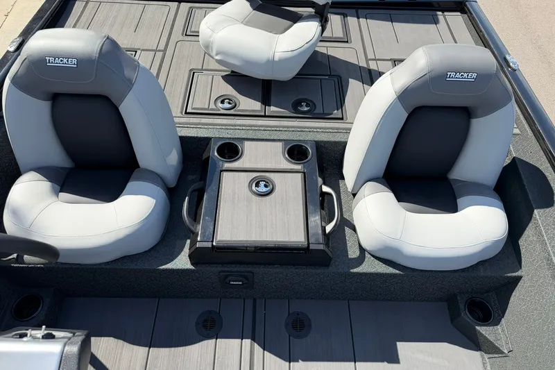 Slide: The Image of 2027 Tracker Savage 215 boat interior with dual seats and center console. - 26