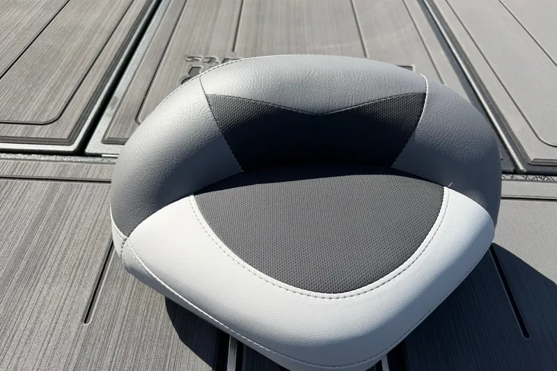 Slide: The Image of Gray and white seat cushion on Tracker Savage 215 boat, 2027 model. - 15