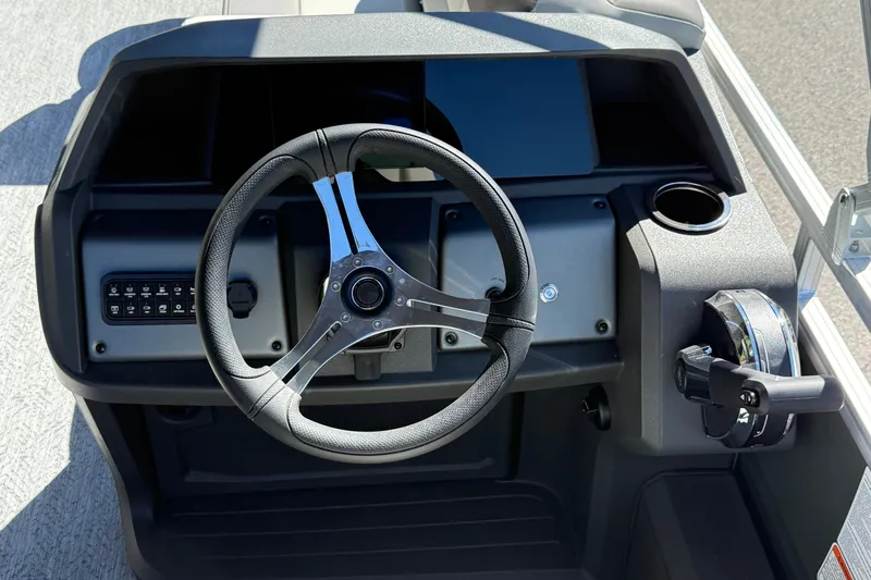 Slide: The Image of Steering console of 2027 Sun Tracker Fishin' Barge 22 DLX pontoon boat. - 14