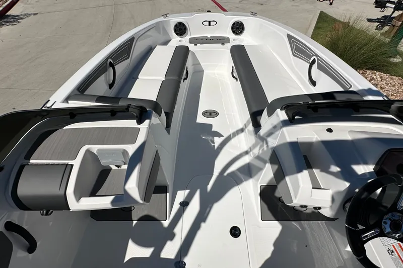 Slide: The Image of 2027 Tahoe T21 boat interior with sleek seating and modern design features. - 10