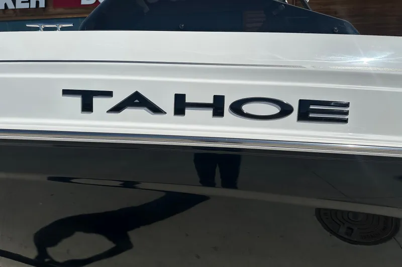 Slide: The Image of 2027 Tahoe T21 boat with sleek design and bold lettering. - 2