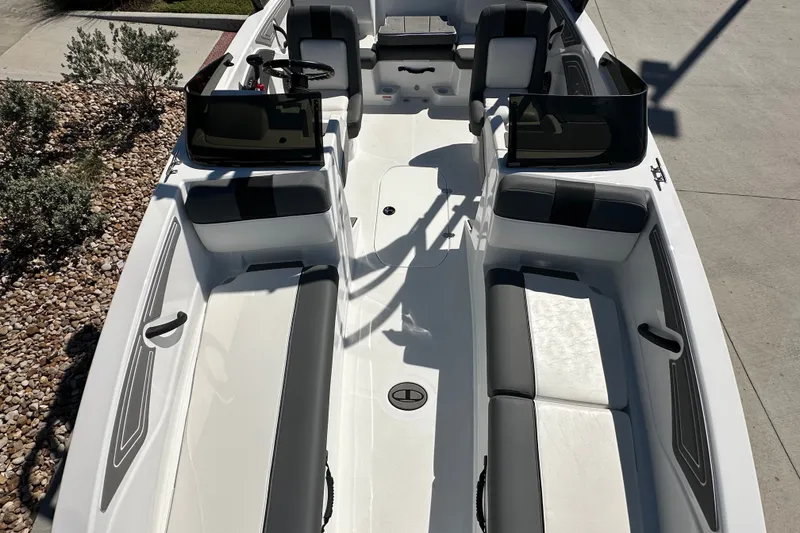 Slide: The Image of 2027 Tahoe T21 boat interior with sleek seating and modern design. - 14