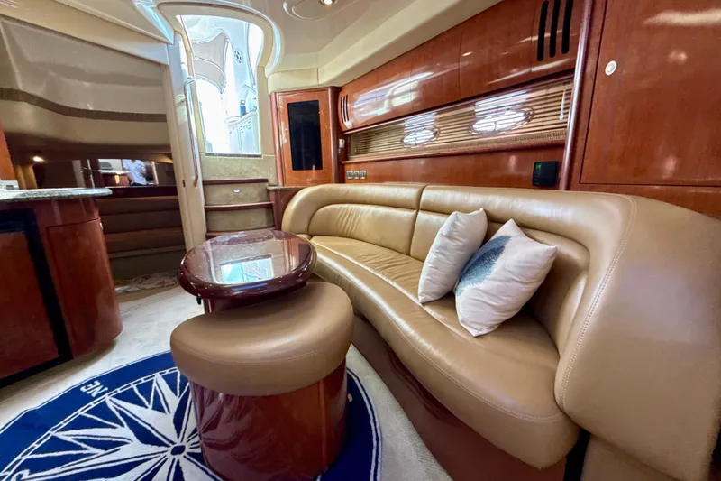 Slide: The Image of Luxurious interior of a 2005 Sea Ray 420 Sundancer yacht with elegant seating and decor. - 19