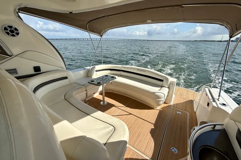 Slide: The Image of Luxurious 2005 Sea Ray 420 Sundancer yacht interior with elegant seating and ocean view. - 15