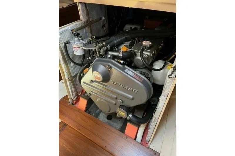 Slide: The Image of Engine compartment of a 1932 Nevins 46 Yawl, featuring a Yanmar engine. - 7