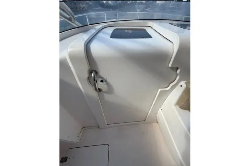 Slide: The Image of 2008 Intrepid 370 Cuddy cabin door with sleek design and secure latch. - 41