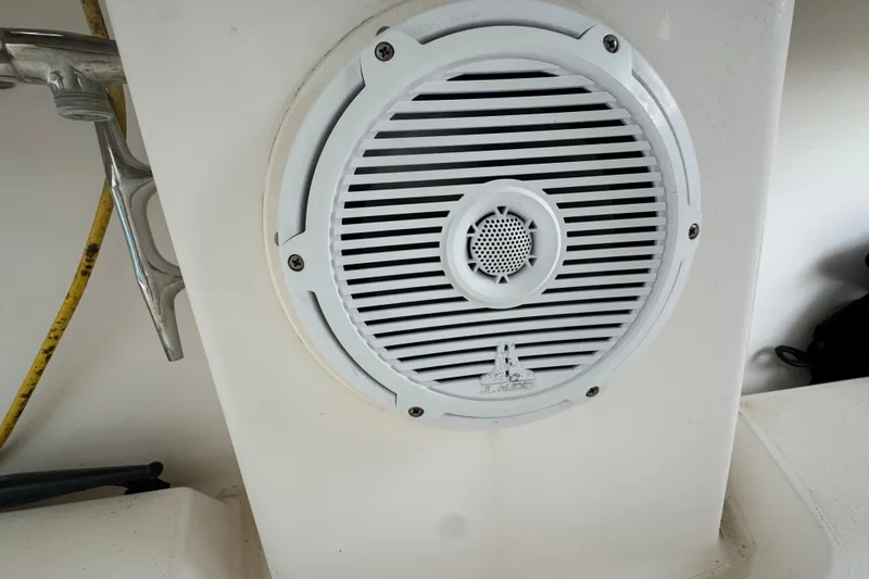 Slide: The Image of White speaker on a 2008 Intrepid 370 Cuddy boat interior. - 65