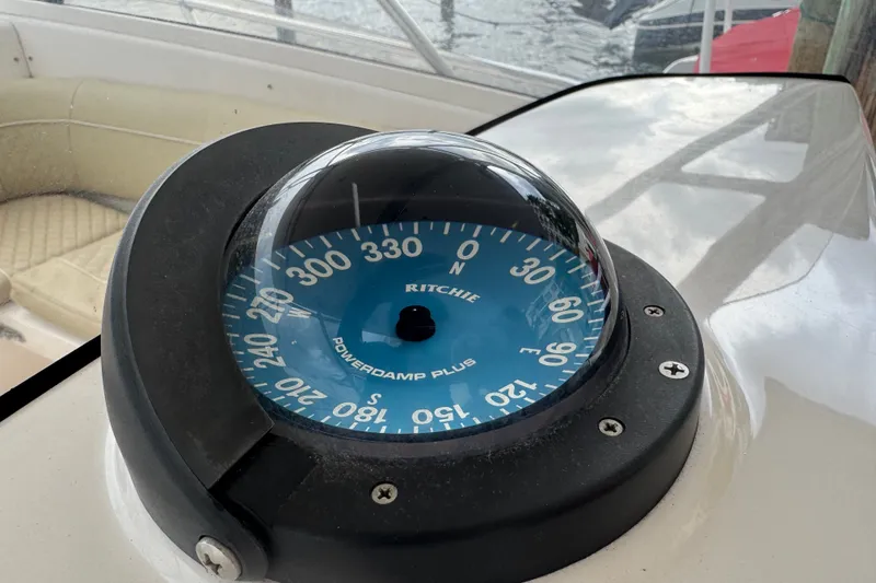Slide: The Image of Compass on 2008 Intrepid 370 Cuddy boat, featuring Ritchie Powerdamp Plus. - 32