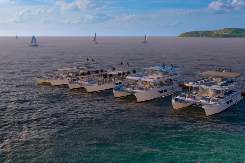 Slide: The Image of Cuatro catamaranes Custom PAXCAT en el mar, modelo 2027. - 19