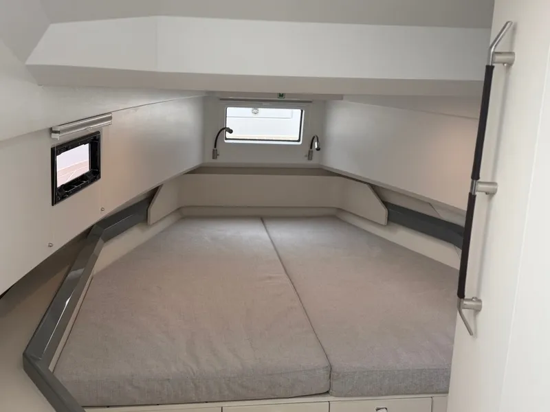 Slide: The Image of Interior of the 2027 Fjord 39 XP featuring a cozy sleeping area and modern fixtures. - 14