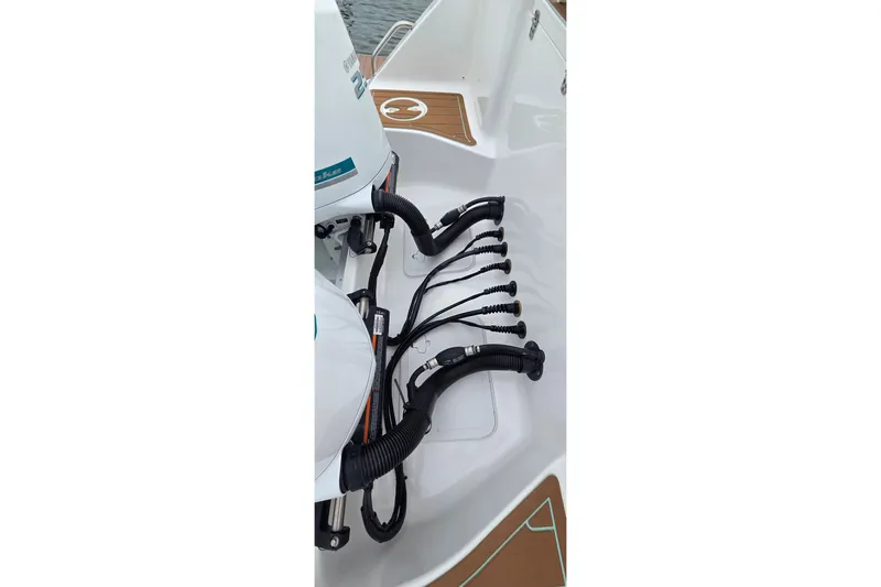 Slide: The Image of 2021 Sea Hunt Gamefish 27CB boat engine cables and connections. - 32