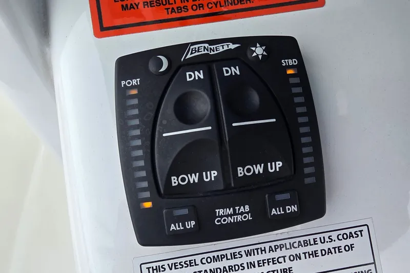 Slide: The Image of Trim tab control panel on 2021 Sea Hunt Gamefish 27CB boat. - 22
