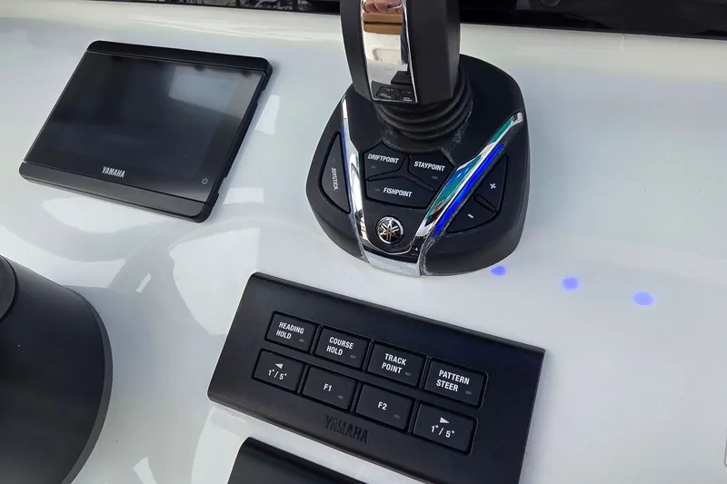 Slide: The Image of Control panel of 2021 Sea Hunt Gamefish 27CB boat with Yamaha joystick and display. - 23