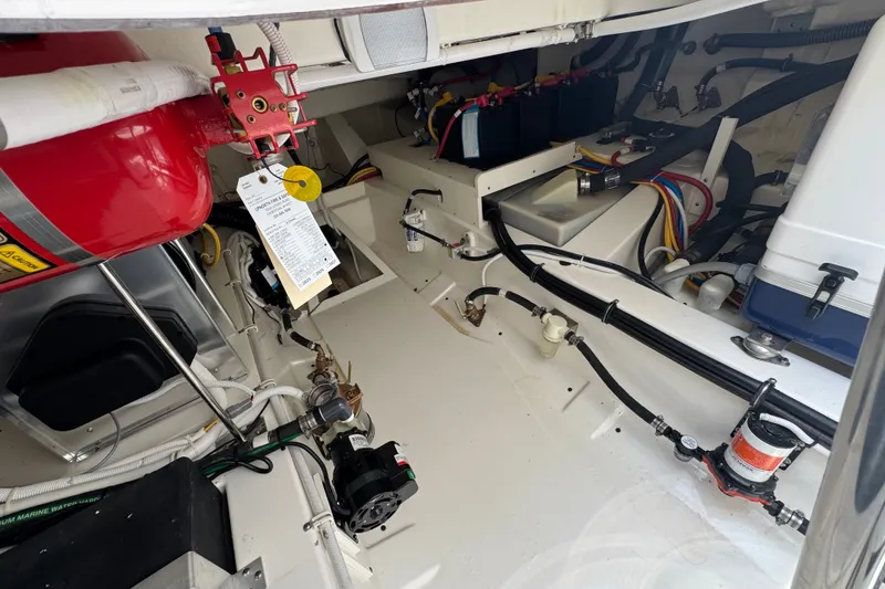 Slide: The Image of Engine compartment of 2022 Tiara Yachts 43 LS, showcasing wiring and mechanical components. - 9
