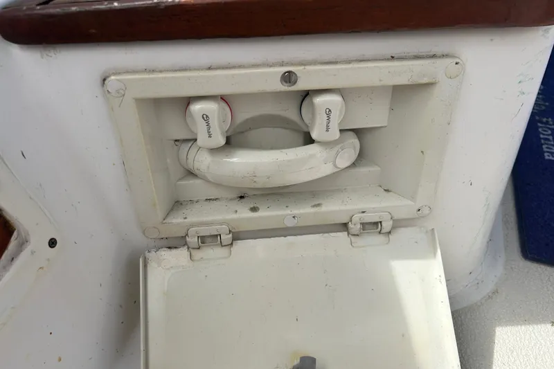 Slide: The Image of Cockpit shower on a 1979 Tartan 37 sailboat, featuring hot and cold. - 15