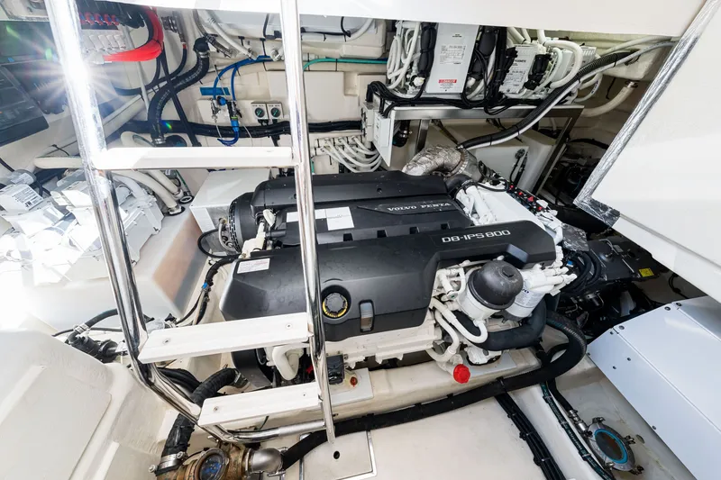 Slide: The Image of Engine room of 2024 Riviera 4600 Sport Yacht Platinum Edition with Volvo Penta engine. - 69