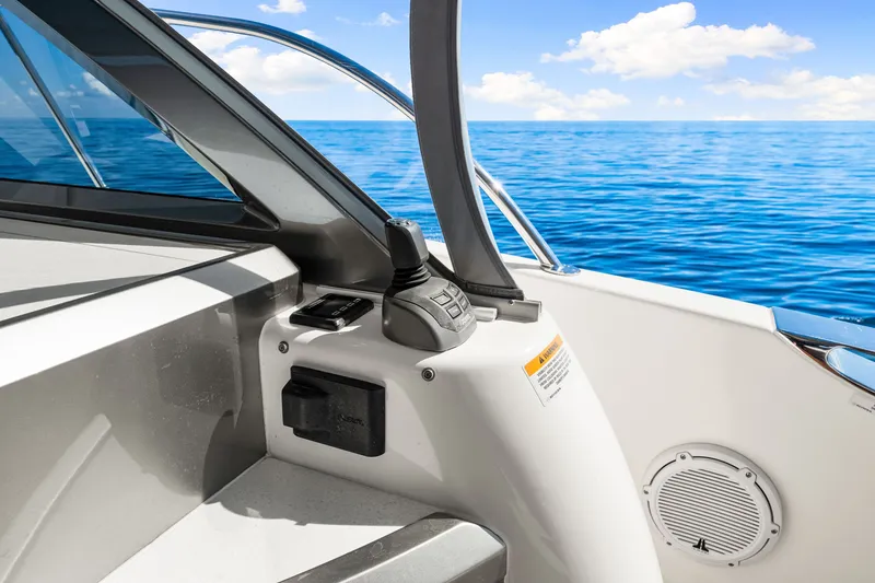 Slide: The Image of 2024 Riviera 4600 Sport Yacht Platinum Edition helm with ocean view. - 31