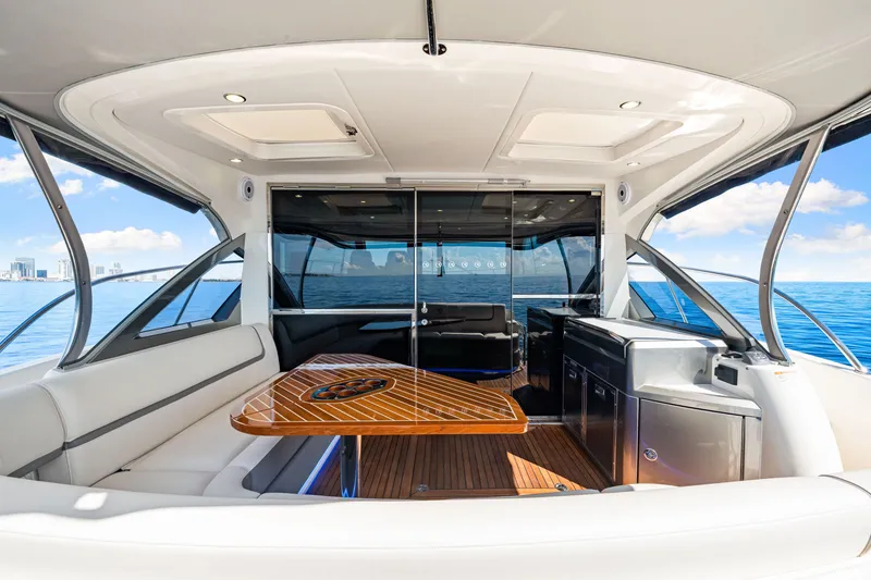 Slide: The Image of Luxurious interior of 2024 Riviera 4600 Sport Yacht Platinum Edition with ocean view. - 25