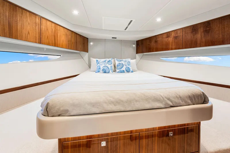 Slide: The Image of Luxurious bedroom interior of 2024 Riviera 4600 Sport Yacht Platinum Edition. - 63