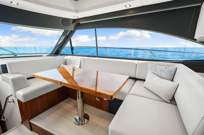 Slide: The Image of Luxurious interior of 2024 Riviera 4600 Sport Yacht Platinum Edition with ocean view. - 49