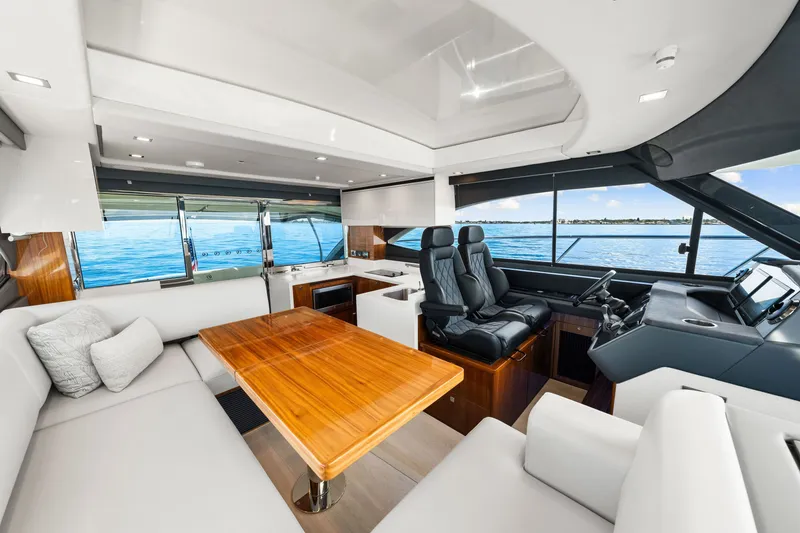 Slide: The Image of Luxurious interior of 2024 Riviera 4600 Sport Yacht Platinum Edition with ocean view. - 50