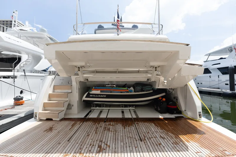 Slide: The Image of 2024 Sanlorenzo SL90A yacht with open garage, showcasing a Williams tender inside. - 113