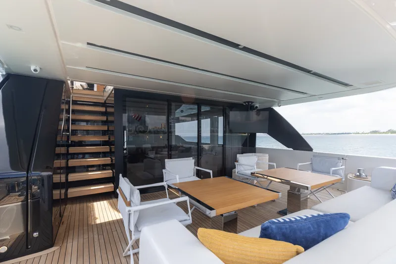 Slide: The Image of Luxurious 2024 Sanlorenzo SL90A yacht deck with modern seating and ocean view. - 72