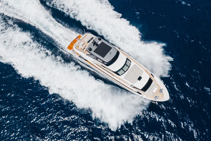 Slide: The Image of Aerial view of 2024 Sanlorenzo SL90A yacht cruising on open sea. - 15