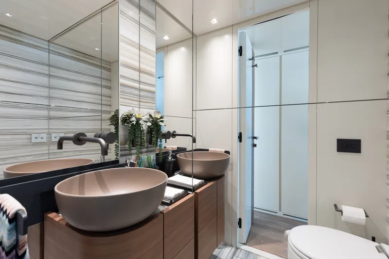 Slide: The Image of Luxurious bathroom on 2024 Sanlorenzo SL90A yacht with modern fixtures and elegant design. - 64