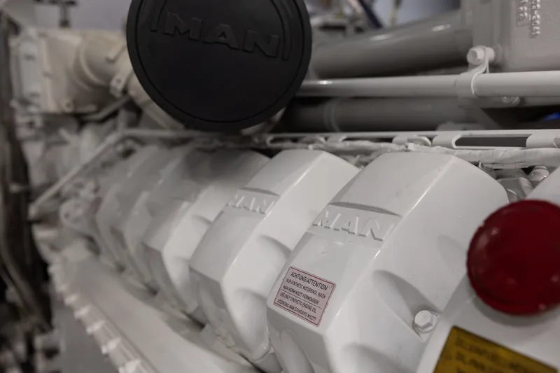 Slide: The Image of Engine detail of 2024 Sanlorenzo SL90A yacht, featuring MAN components. - 110