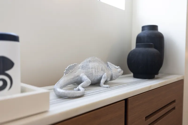 Slide: The Image of Decorative chameleon sculpture on Sanlorenzo SL90A yacht, 2024 model, with elegant vases. - 98