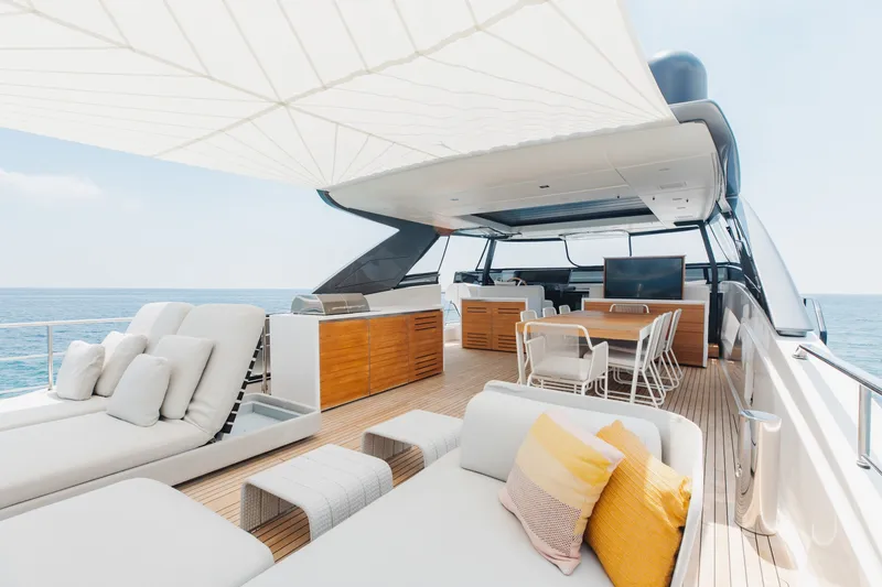 Slide: The Image of Luxurious 2024 Sanlorenzo SL90A yacht deck with elegant seating and ocean view. - 85