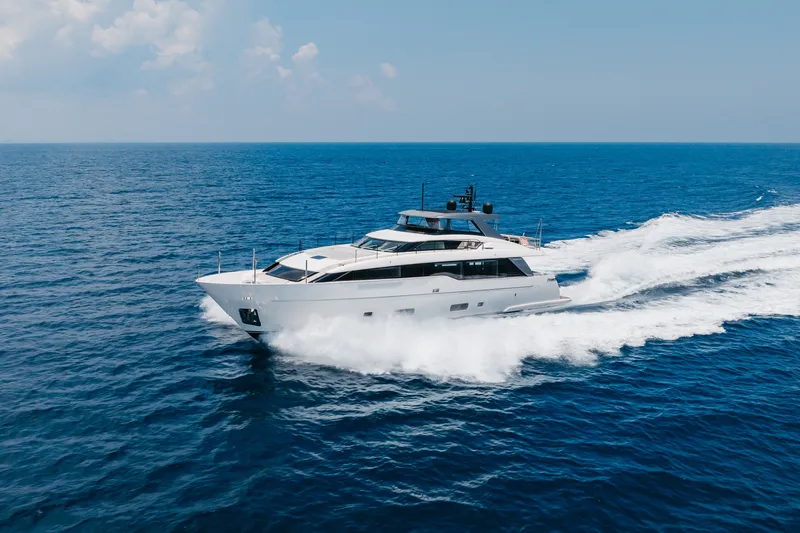Slide: The Image of 2024 Sanlorenzo SL90A yacht cruising on open sea under clear skies. - 19