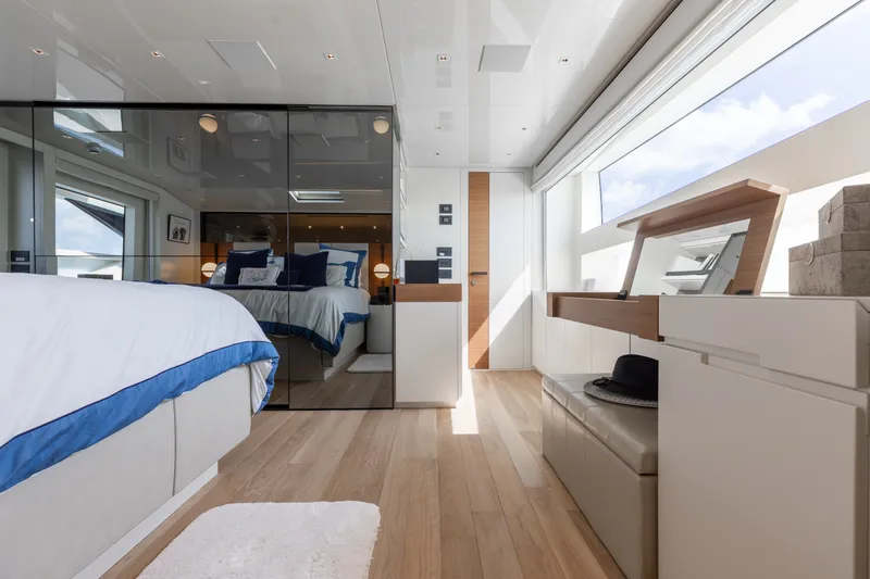 Slide: The Image of Luxurious 2024 Sanlorenzo SL90A yacht bedroom with modern design and large windows. - 56