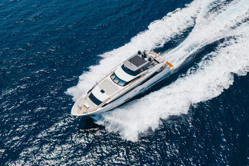 Slide: The Image of Luxury yacht Sanlorenzo SL90A 2024 cruising on open blue sea. - 13