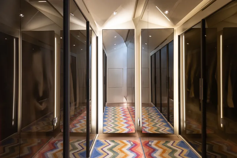 Slide: The Image of Luxurious interior of 2024 Sanlorenzo SL90A yacht with mirrored walls and colorful zigzag carpet. - 61
